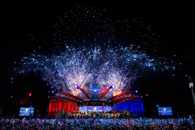 A fireworks display explodes in celebration outside Buckingham Palace in London, on June 4, 2012, to mark the end of the Diamond Jubilee Concert (Photo: David Parker/AFP/GettyImages)