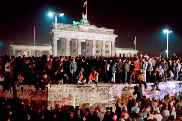 The fall of the Berlin Wall in 1989 was symbolic of the USSR’s collapse (image: AFP/Getty Images)
