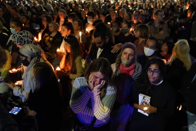 Members of the public attending a vigil in South London in September in memory of Sabina Nessa, 