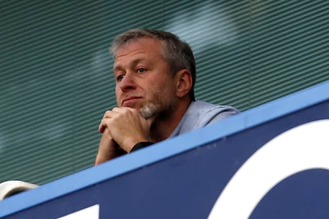 Chelsea owner Roman Abramovich says he is ”giving trustees of Chelsea’s charitable Foundation the stewardship and care” of the club, in a statement. 