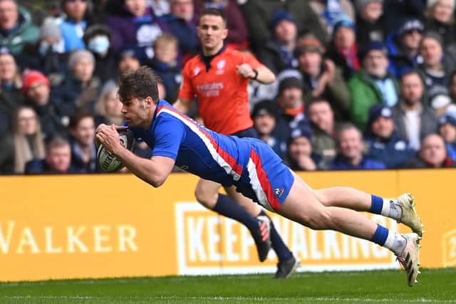 France wing Damian Penaud dives over to score the 6th France try  during the Six Nations Rugby match between Scotland and France 