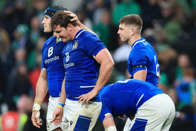 Michele Lamaro and Juan Ignacio Brex of Italy look dejected following their side's defeat in the Six Nations Rugby match between Ireland and Italy