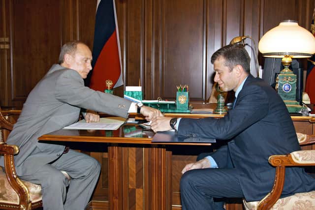 Putin, left, and Abramovich in 2005