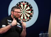 James Wade of England reacts to the wi during his Quarter-Finals Match against Mervyn King of England during Day Fourteen of The William Hill World Darts Championship at Alexandra Palace on January 01, 2022