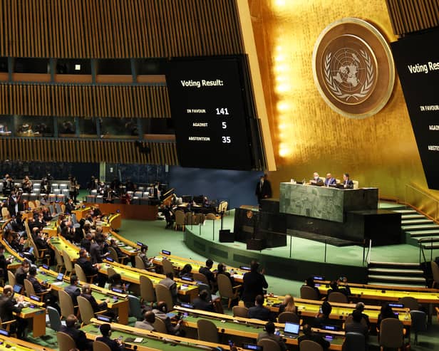 The results of a General Assembly vote on a resolution is shown on a screen during a special session of the General Assembly at the United Nations headquarters.