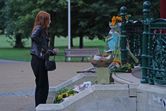 Patsy Stevenson pictured in September 2021 placing a candle she was prevented from laying the first time around at Clapham Common (image: PA)