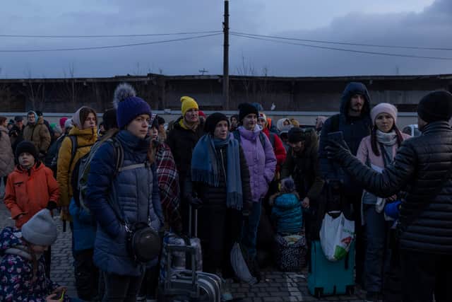 Ukrainian families have fled the country, aiming to reach neighbouring nations such as Poland. (Credit: Getty)