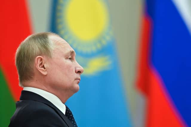 Vladimir Putin pictured in December 2021 - his appearance has provoked speculation about his health (Photo: Getty)