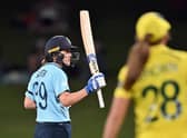Sciver celebrating her half century - she went on to score 109