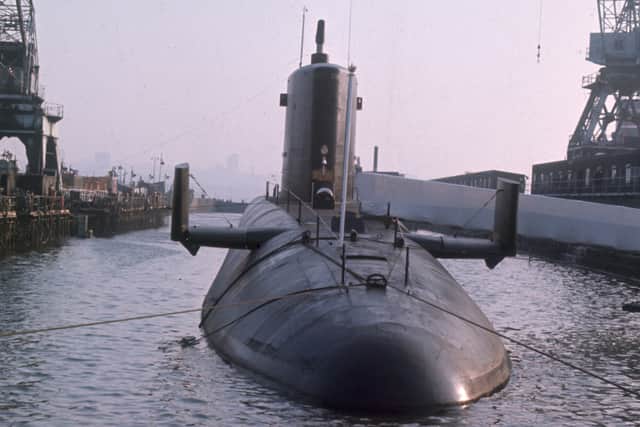 HMS Resolution, the first British nuclear powered Polaris boats (SSBN’s) in dock. Built by Vickers Armstrong in Barrow-in-Furness the vessel was laid down in February 1964 and launched in September 1966. The class were part of the 10th Submarine Squadron, all based at Faslane Naval Base, Scotland. (Photo by Hulton Archive/Getty Images)