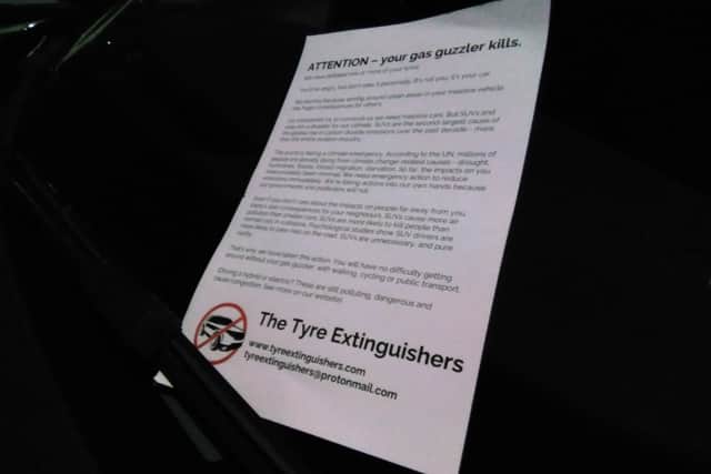 The group left notes attacking drivers’ choice of vehicle