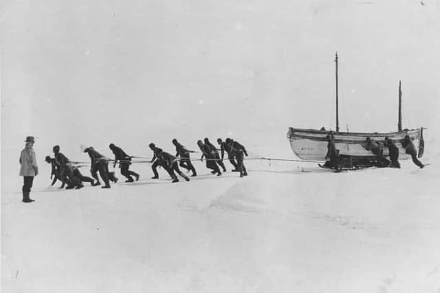 Members of the expedition team led by Sir Ernest Henry Shackleton pulling one of their lifeboats across the snow in the Antarctic, following the loss of the ‘Endurance’ (Photo: Hulton Archive/Getty Images)