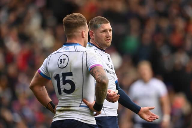 Scotland fly half Finn Russell in discussion with captain Stuart Hogg after another France try during the Six Nations Rugby match between Scotland and France at BT Murrayfield Stadium on February 26, 2022 