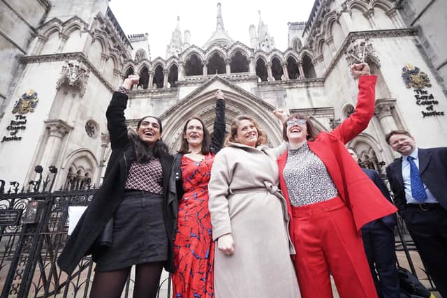 Reclaim These Streets founders (left to right) Henna Shah, Jamie Klingler, Anna Birley and Jessica Leigh celebrate outside the Royal Courts of Justice (PA)