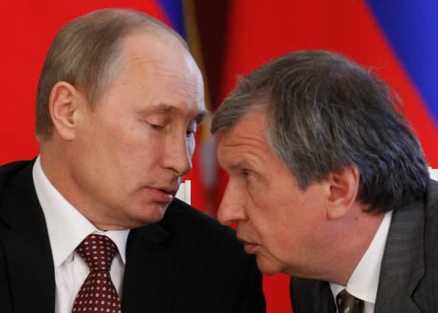 Igor Sechin pictured alongside Vladimir Putin in 2013. (Credit: Getty)