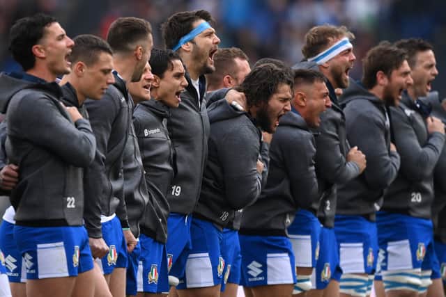 Players of Italy participate in the national anthem prior to the Guinness Six Nations Rugby match between Italy and Scotland at Stadio Olimpic