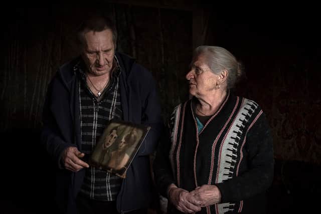Vasyl and Olga at their house in a village in Eastern Ukraine. For three years, since 2014, they lived almost constantly in the basement (Photo: DEC)