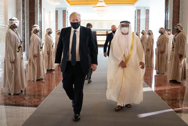 Prime Minister Boris Johnson inspects the Guard of Honour as he arrives at Abu Dhabi airport for his visit to the United Arab Emirates on March 16, 2022 in Abu Dhabi, United Arab Emirates (Photo: Stefan Rousseau - WPA Pool/Getty Images)