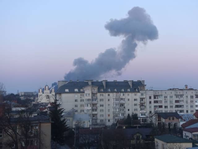 Smoke rises after an explosion in the western Ukrainian city of Lviv, after Russian forces destroyed an aircraft repair plant (Photo: YURIY DYACHYSHYN/AFP via Getty Images)