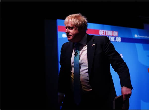 Prime Minister Boris Johnson leaves the stage after speaking at the Conservative Party Spring Forum at Winter Gardens, Blackpool (PA)