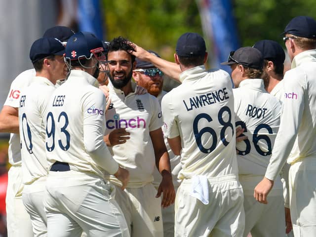 Mahmood celebrates one of his four wickets in his first Test match