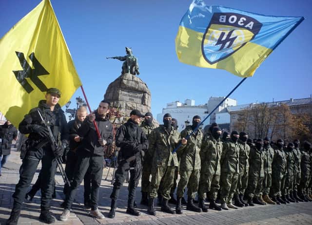 Servicemen of the pro-Ukrainian Azov battalion attend an oath ceremony in Kyiv in 2014 (Photo: GENYA SAVILOV/AFP via Getty Images)