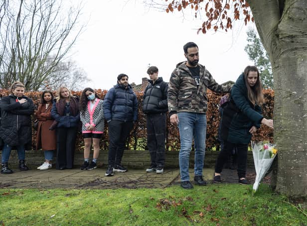 <p>Flowers being laid at a memorial where Yousef was stabbed</p>