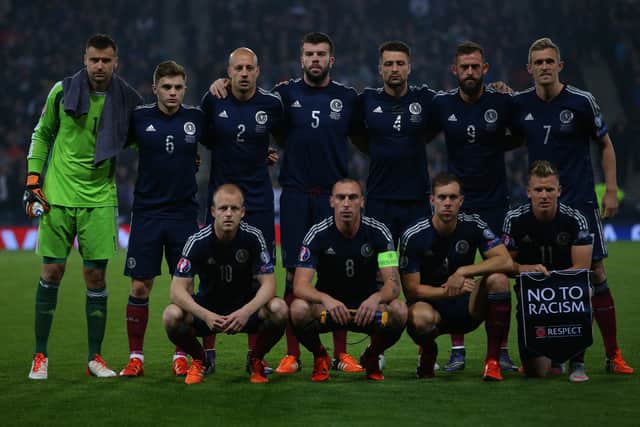 Scotland team pose for a photo during the UEFA EURO 2016 qualifier between Scotland and Poland at Hampden Park on October 08, 2015