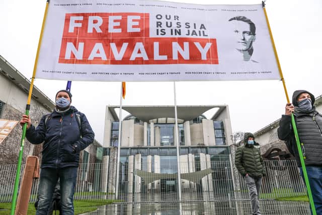 Protesters pictured earlier this year in Berlin support of Russian opposition politician Alexei Navalny.
