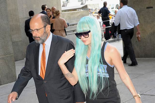 Amanda Bynes and attorney Gerald Shargel appear at Manhattan Criminal Court on  9 July 2013, when Bynes faced charges of reckless endangerment, tampering with evidence and criminal possession of marijuana in relation to her arrest on 23 May 2013 (Photo: Dave Kotinsky/Getty Images)