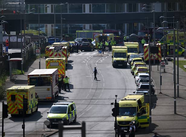 <p>Ambulances arrive as emergency services evacuate people from the London Aquatics Centre.</p>