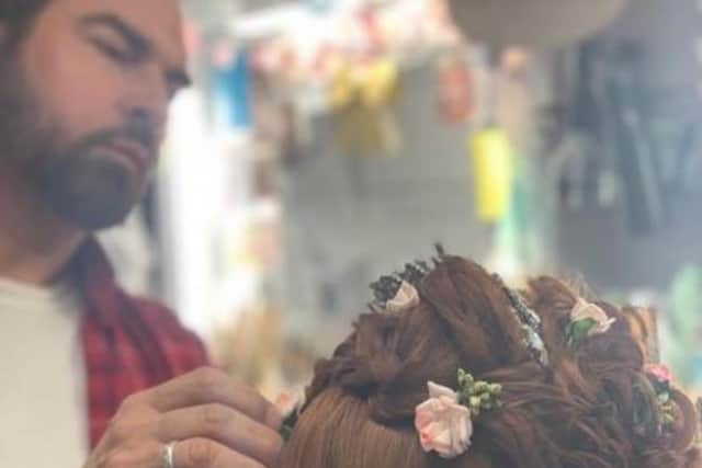 Marc Pilcher working on the hair of Harriet Cans for Bridgerton season 1 (Credit: marcelliotpilcher - Instagram)