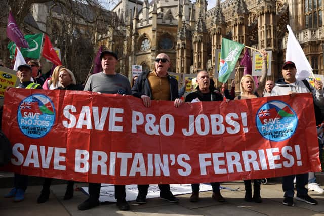 Sacked staff protested P&O Ferries’ so-called ‘fire and rehire’ practices after 800 members of staff were made redundant without warning. (Credit: Getty)