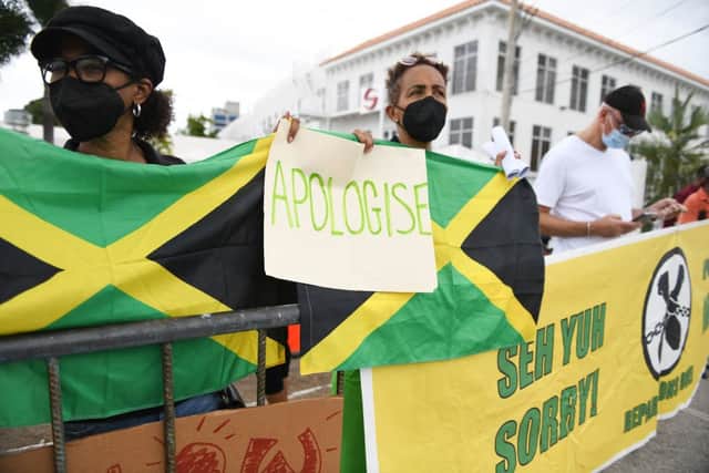 People calling for slavery reparations, protest outside the entrance of the British High Commission during the visit of the Duke and Duchess of Cambridge in Kingston, Jamaica on 22 March 2022 (Photo: RICARDO MAKYN/AFP via Getty Images)