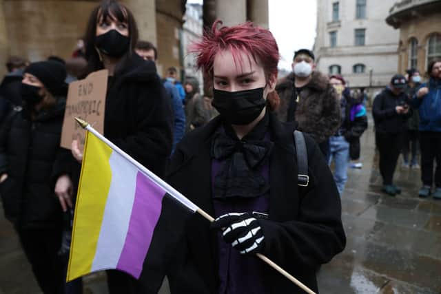 The non-binary flag is yellow, white, purple and black (Photo: Hollie Adams/Getty Images)
