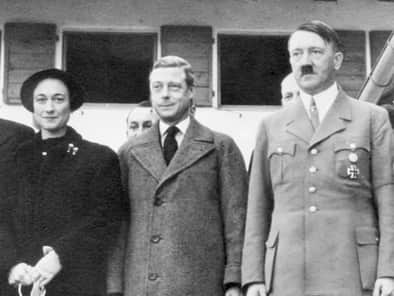 Duke and Duchess of Windsor are photographed with Adolf Hitler in 1937.