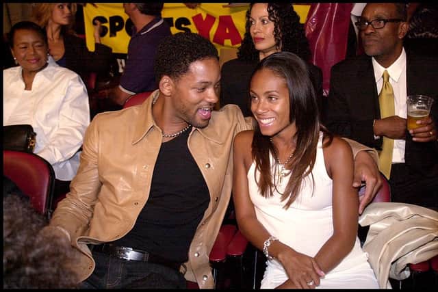 Will Smith and Jada Pinkett Smith watch Laila Ali, daughter of former professional boxer Muhammad Ali, knocking out her opponent Marjorie Jones on 15 June 2000 (Photo: Dan Callister/Online USA)