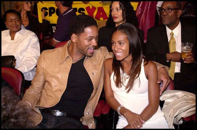 Will Smith and Jada Pinkett Smith watch Laila Ali, daughter of former professional boxer Muhammad Ali, knocking out her opponent Marjorie Jones on 15 June 2000 (Photo: Dan Callister/Online USA)