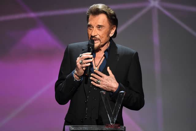 Musician Johnny Hallyday is the featured musician behind Netflix’s latest docuseries Beyond Rock (Photo credit: BERTRAND GUAY/AFP via Getty Images)
