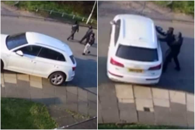 Terrifying CCTV footage shows the moment a group tried to carjack a mum with her young son inside the vehicle.