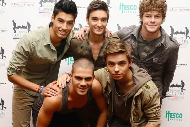Tom Parker (centre, back row) was a member of The Wanted - a boy band who scored a slew of top 10 hits in the 2010s (image: PA)