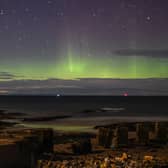 The Aurora Borealis above the WW2 beach defences in Lossiemouth, Scotland in 2021 (Photo: Peter Summers/Getty Images)