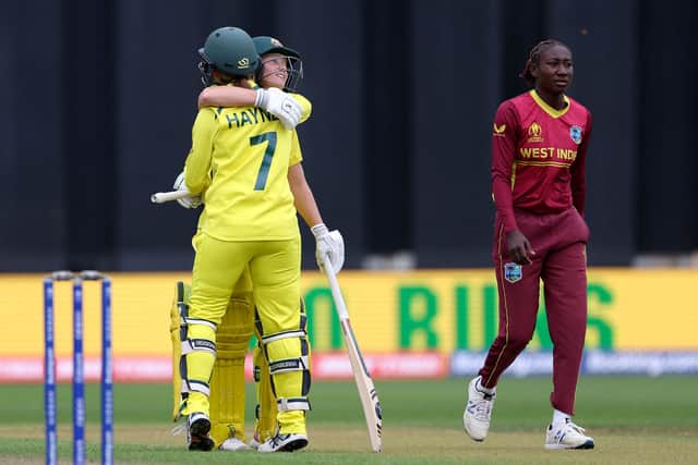 Alyssa Healy celebrates her century during Australia’s semi final win against West Indies