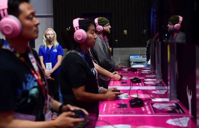 Gaming fans play Catherine: Fullbody from Atlus at the 2019 Electronic Entertainment Expo (Photo: FREDERIC J. BROWN/AFP via Getty Images)