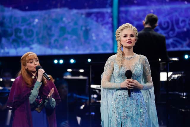  Stephanie McKeon  and Samantha Bark performing in Frozen the musical (Photo by John Phillips/Getty Images for The National Lottery )