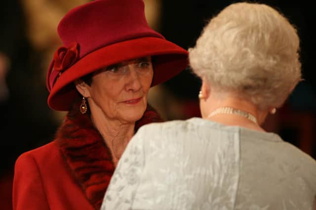 June Brown in Buckingham Palace, London, receiving an MBE for services to Drama and Charity from Queen Elizabeth II.