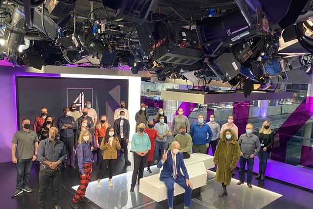 Jon Snow with colleagues in the Channel 4 News newsroom ahead of his final Channel 4 News programme (Photo: PA)
