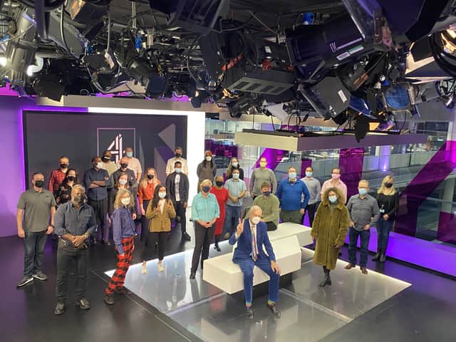 Jon Snow with colleagues in the Channel 4 News newsroom ahead of his final Channel 4 News programme (Photo: PA)