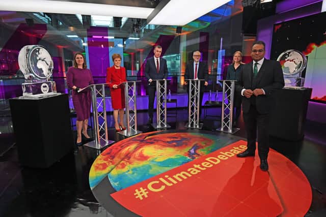 Krishnan Guru-Murthy with (rear left to right) Liberal Democrat leader Jo Swinson, SNP leader Nicola Sturgeon, Plaid Cymru leader Adam Price, Labour Party leader Jeremy Corbyn and Green Party Co-Leader Sian Berry, standing next to ice sculptures representing the Brexit Party and Conservative Party who didn’t appear at the general election climate debate in 2019 (Photo: Kirsty O’Connor - WPA Pool/Getty Images)