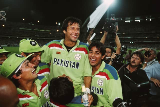 Khan celebrates with team mates after a 1992 Cricket World Cup Final victory against England in Melbourne (Photo: Tony Feder/Allsport/Getty Images)